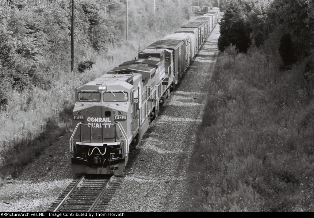 CR 6123 leads OIPI west at the Higginsville Bridge